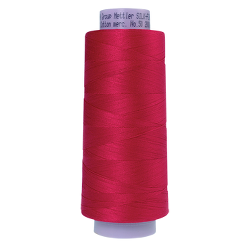 Mettler sewing thread spool in Poinsettia (0102) - 50wt 1829m