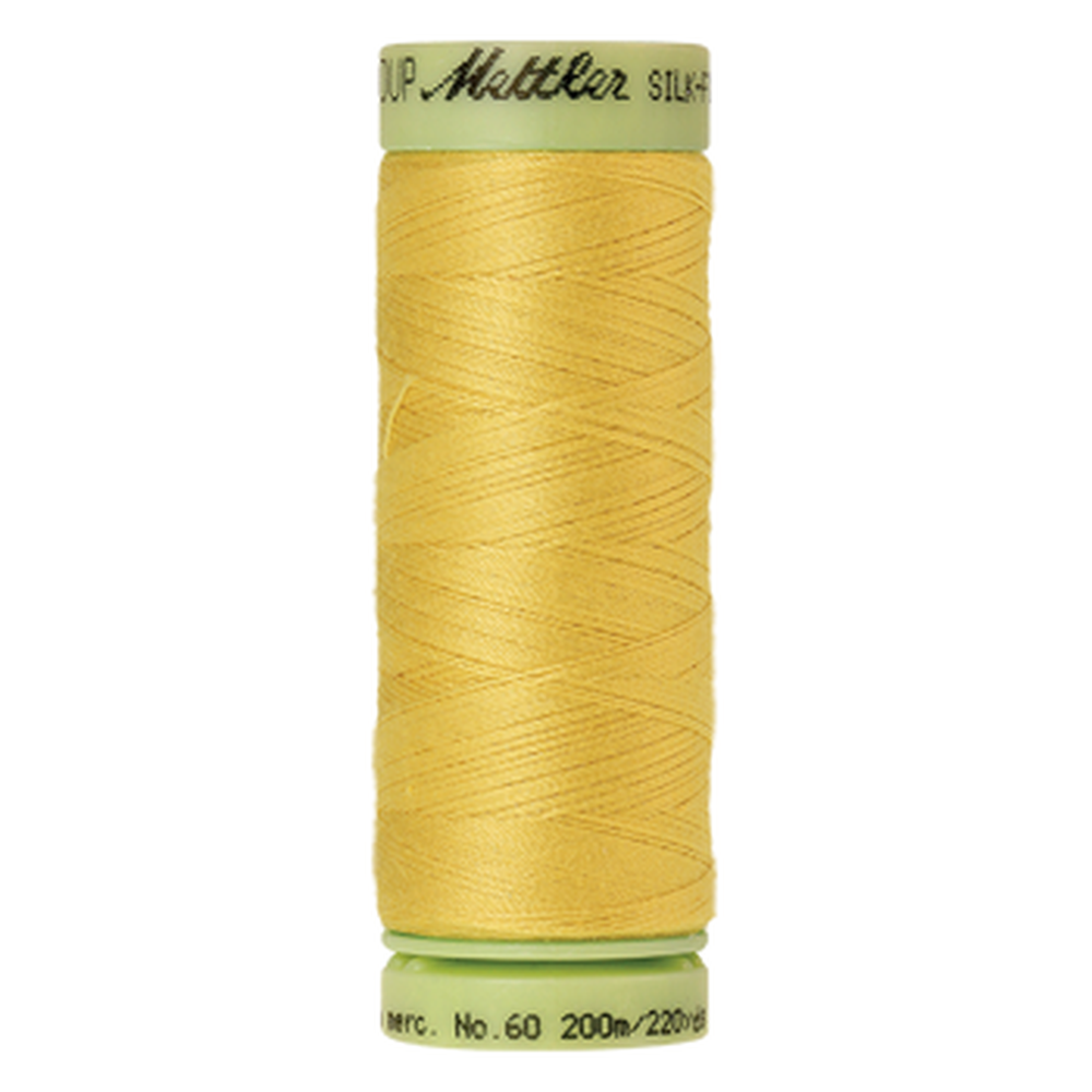 Mettler sewing thread spool in Lemon Peel (0115) - 60wt 200m