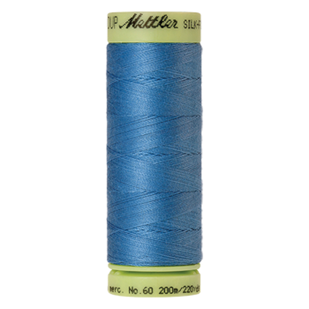 Mettler sewing thread spool in Reef Blue (0338) - 60wt 200m