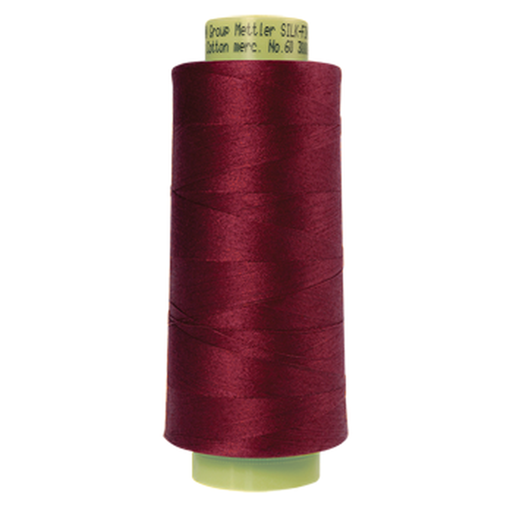 Mettler sewing thread spool in Cranberry (0918) - 60wt 2743m