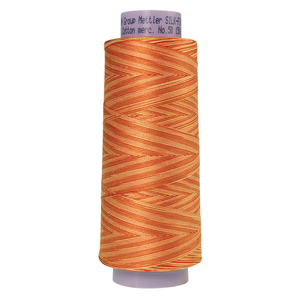 Mettler sewing thread spool in Orange Ana (9831) - 50wt 1372m