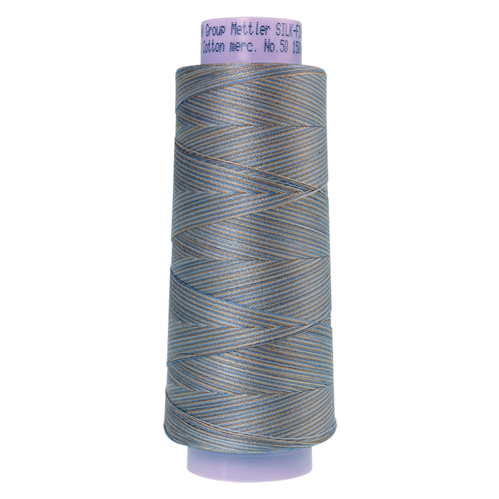 Mettler sewing thread spool in Silvery Blues (9843) - 50wt 1372m