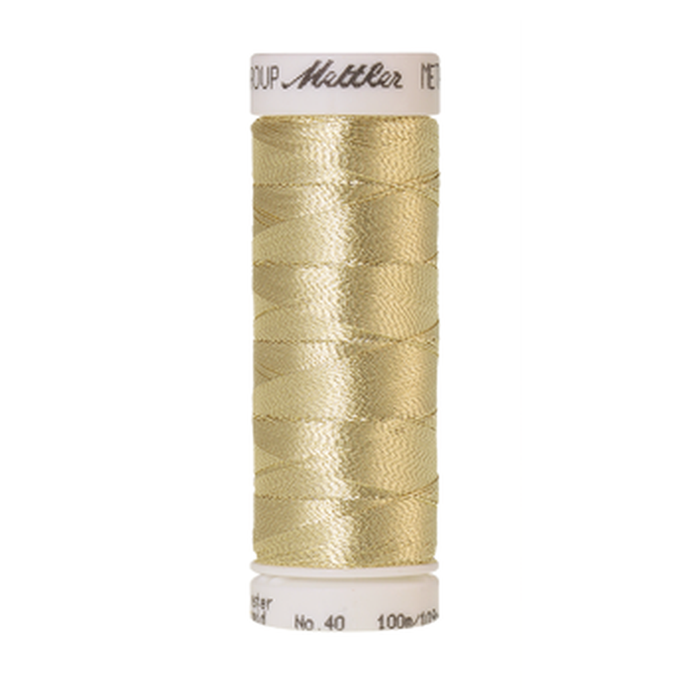 Mettler metallic embroidery thread spool in Pale Gold (0496) - 40wt 100m
