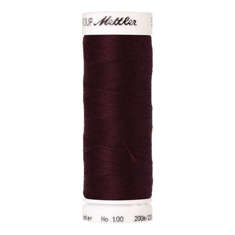 Mettler Seralon sewing thread spool in Beet Red (0111) - 62/2 200m