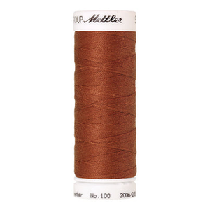 Mettler Seralon sewing thread spool in Brick Red (1054) - 62/2 200m