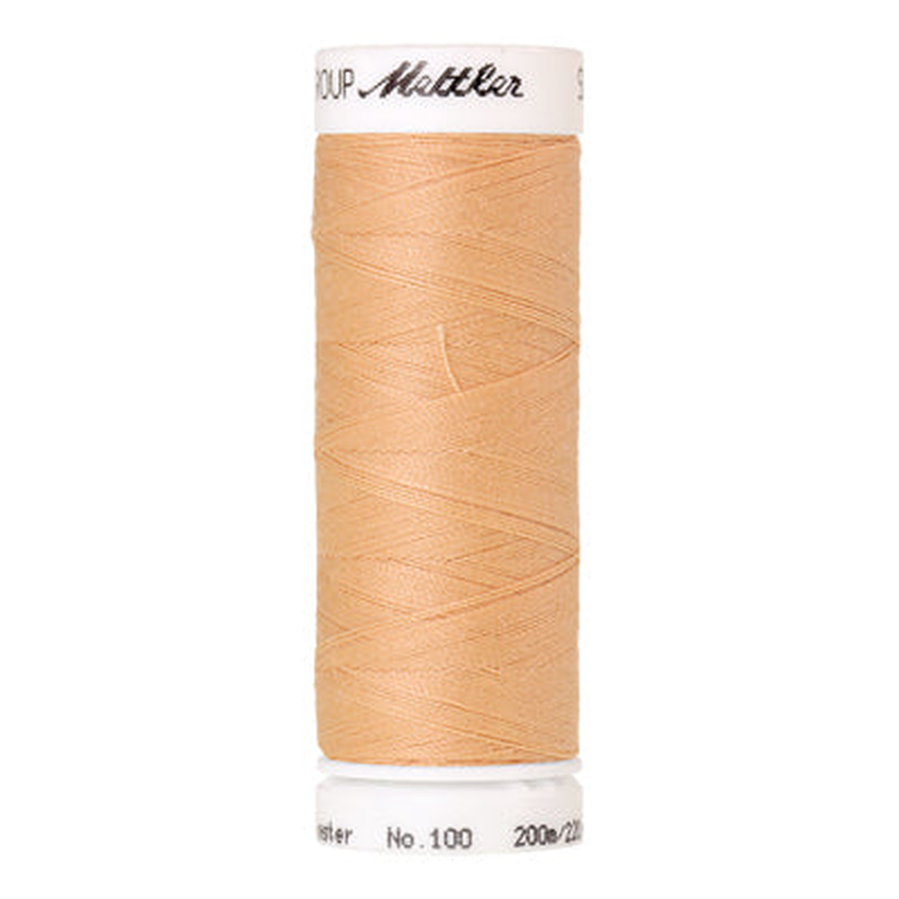 Mettler Seralon sewing thread spool in Shrimp Pink (1163) - 62/2 200m