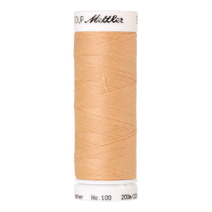 Mettler Seralon sewing thread spool in Shrimp Pink (1163) - 62/2 200m