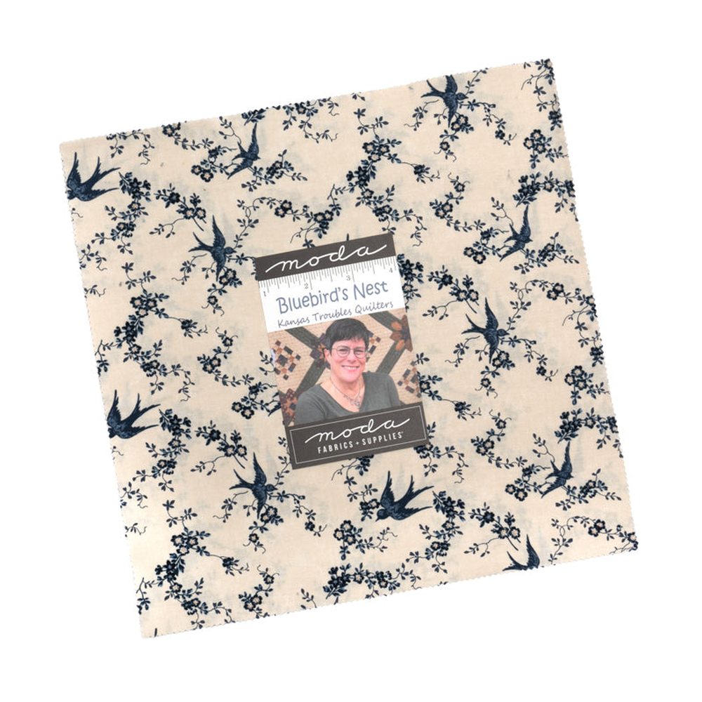 Bluebirds Nest patterned cotton quilting fabric by Moda