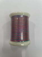 Superior Threads embroidery thread spool in Rainbows - detail view