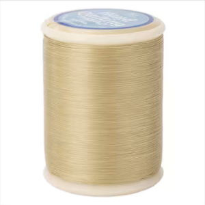 YLI quilting thread spool in Ecru