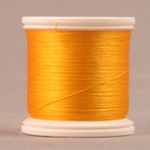 YLI silk thread spool in Goldenrod (231) - #100 200m