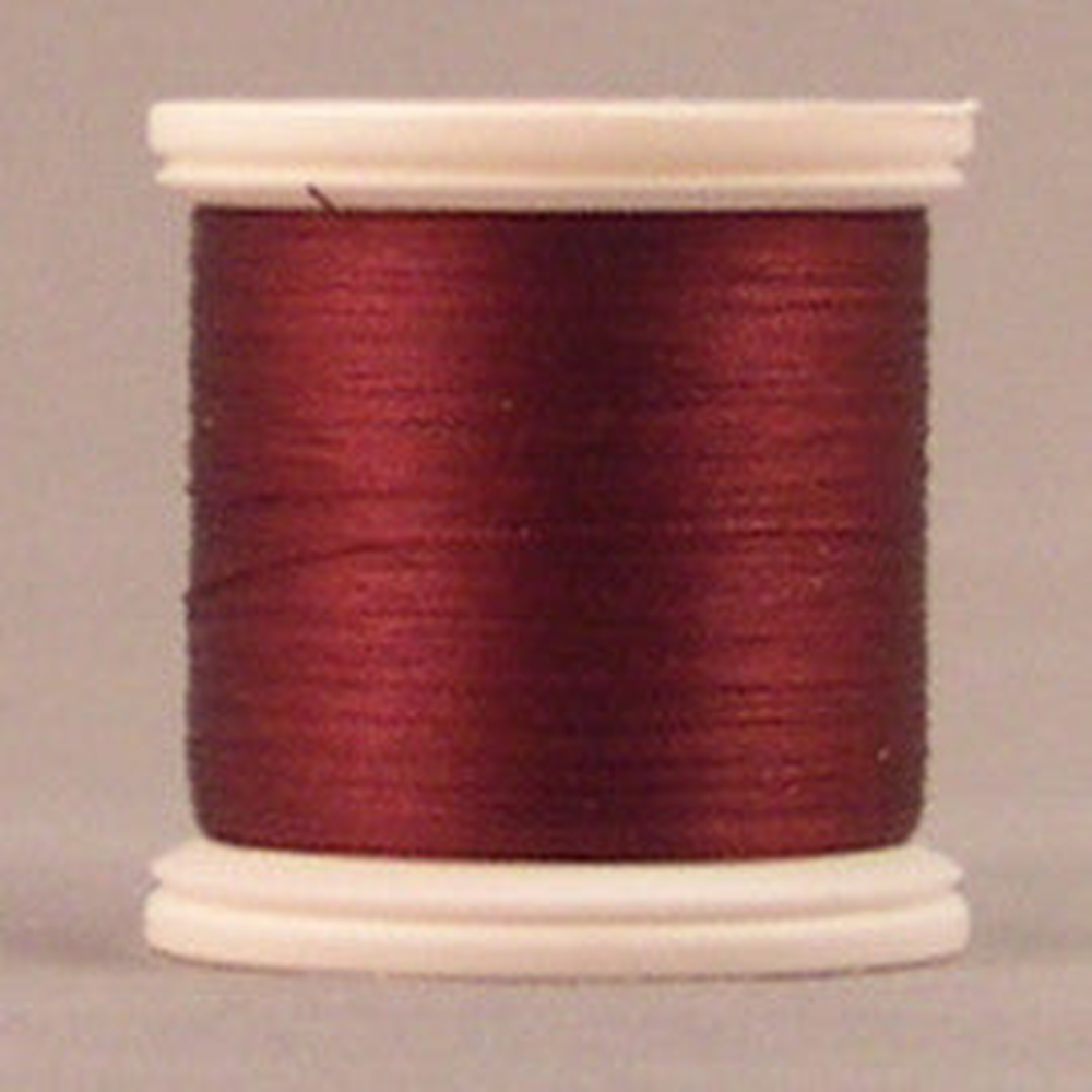 YLI silk thread spool in Maroon (228) - #100 200m
