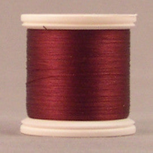 YLI silk thread spool in Maroon (228) - #100 200m
