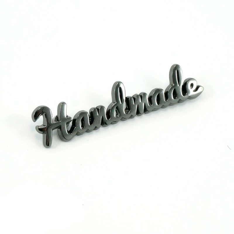 Emmaline Metal Bag Script Label 'Handmade'