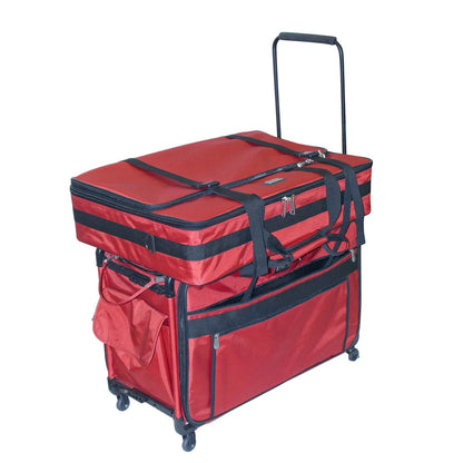 A red Tutto brand large embroidery module tote made from ballistic nylon with a fibreglass frame, featuring multiple pockets and a shoulder strap. On top of a matching Tutto Machine Trolley