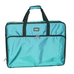 A turquoise Tutto brand large embroidery module tote made from ballistic nylon with a fibreglass frame, featuring multiple pockets and a shoulder strap.